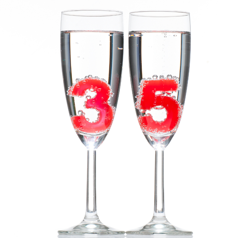 Verjaardagskaarten - 35 in champagne glazen